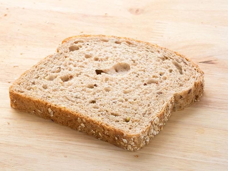 Pain, blé entier, faible en sodium (1 tranche)